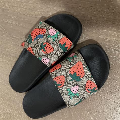 gucci slides with strawberry.